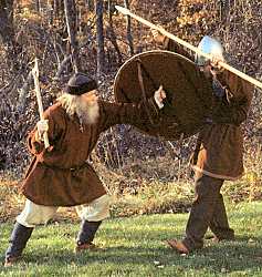 punching the face with the shield edge